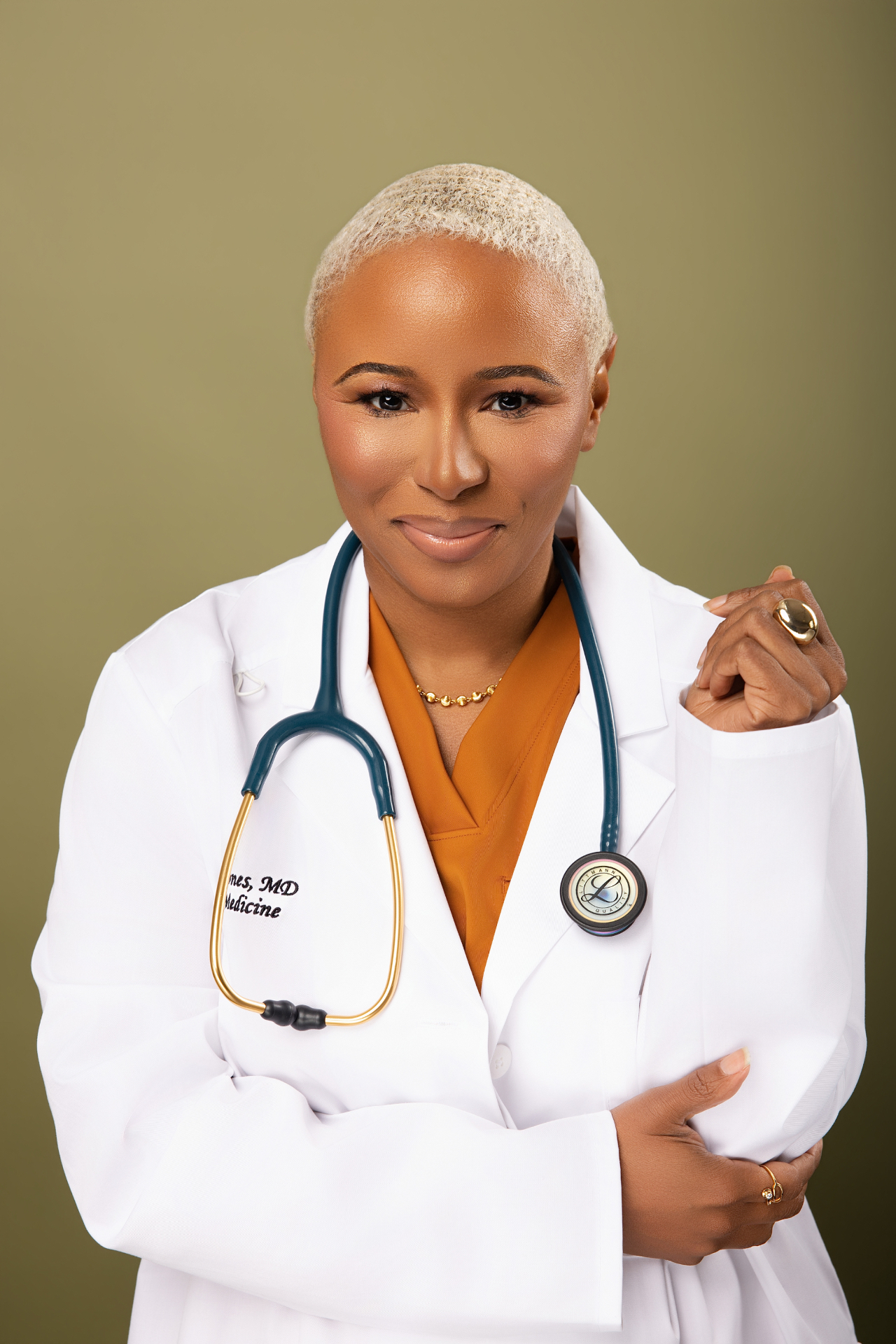Dr. Erica R. Jones wearing her white coat and stethoscope